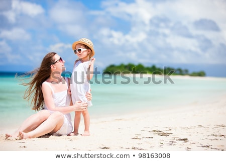 ストックフォト: Young Beautiful Mother And Her Adorable Little Daughter At Tropical Beach