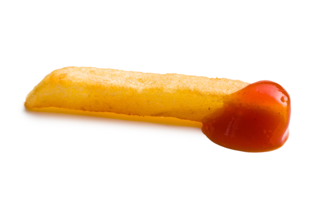 Stock photo: One Piece Of French Fries With Ketchup