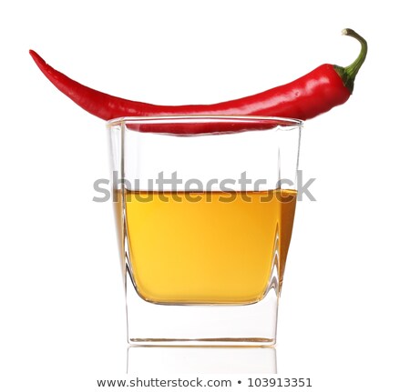 Zdjęcia stock: Glass Of Vodka And Red Chilli Peppers Isolated On White