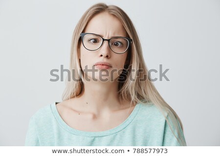 Zdjęcia stock: Blond Woman Making A Grimace