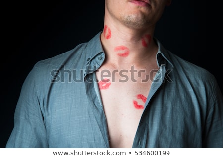 Foto stock: Businessman With Lipstick Kiss Marks On Shirts Collar