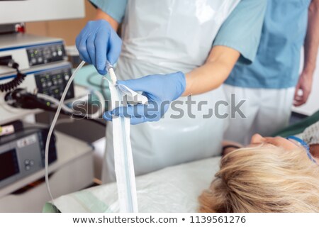 Nurse Unpacking Gastroscopy Tube In Hospital Foto stock © Kzenon