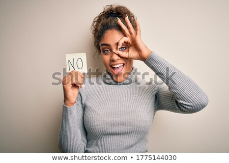 ストックフォト: Young Girl Looking At Positive Negative Signs