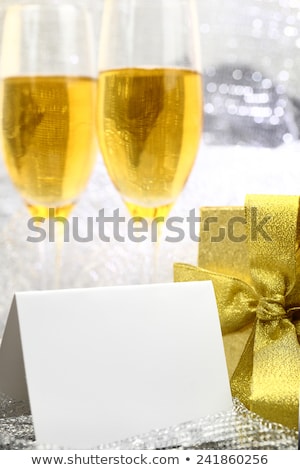 Stok fotoğraf: Champagne Blank Card And Gift Boxes