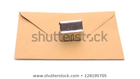Stock fotó: Metall House Shaped Object On Brown Envelope