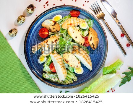 Stok fotoğraf: Caesar Salad In Ceramic Bowl Selective Focus