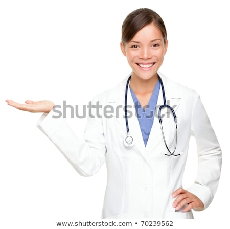 Portrait Of Female Nurse Holding Out Open Palm Stock foto © Maridav