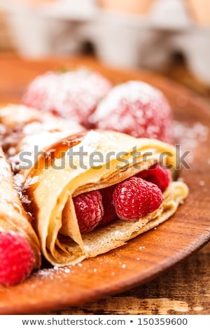 Freshly Prepared Crepes With Raspberries Zdjęcia stock © grafvision