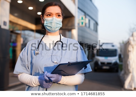 Foto stock: Hospital Doctor With Clipboard