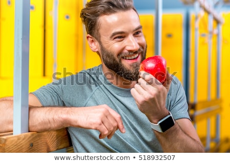 Stok fotoğraf: Man Eating An Apple