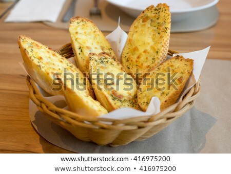 Stockfoto: Close Up Of Basket With Garlic
