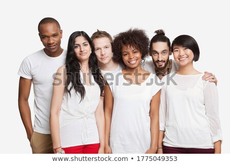 Stock photo: Side View Of Group Of Multi Ethnic Friends Standing In Front Of The Sea With Their Surfboards And Lo