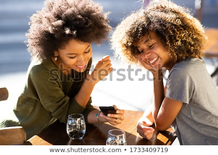 Stock photo: Woman Sitting In Cafe Outdoors