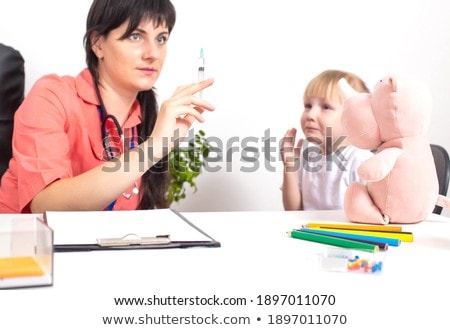 Stock photo: Doctor Injecting A Funk Patient
