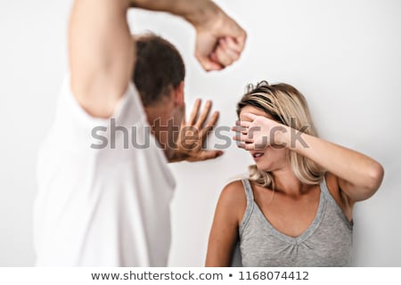 Stockfoto: Man Beating Helpless Woman At Home White Background