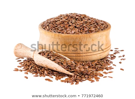 Stock photo: Close Up Of Flax Seeds And Wooden Spoon