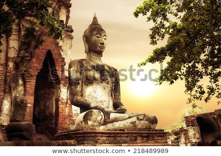 Сток-фото: Buddha At Wat Mahathat Ruins Under Sunset Sky