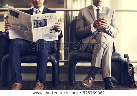 [[stock_photo]]: Business Man Reading Newspaper