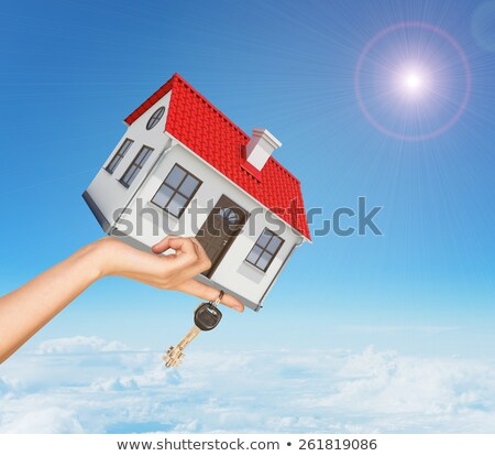 ストックフォト: White House In Hand With Red Roof Chimney Background Sun Shines Brightly