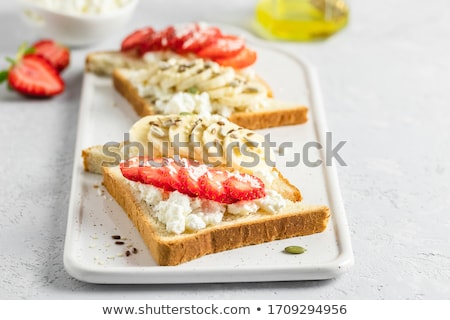 Stockfoto: Crispbread With Butter And Honey Or Maple Syrup