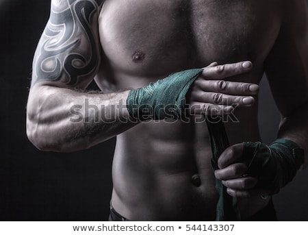 Сток-фото: The Hands Of Muscular Man With Bandage