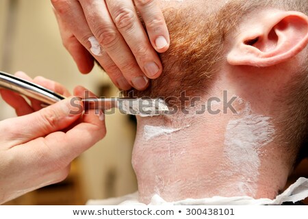 Stok fotoğraf: Preparing For Trimming In Barbershop