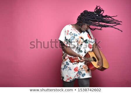 Stock foto: Passionate Woman Guitarist With Flying Hair Playing
