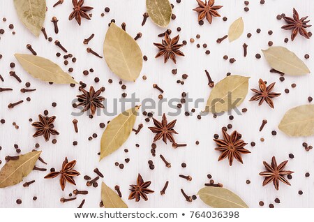 Stock fotó: Anise Stars Clove Bay Leaves Pattern On White Wood Background