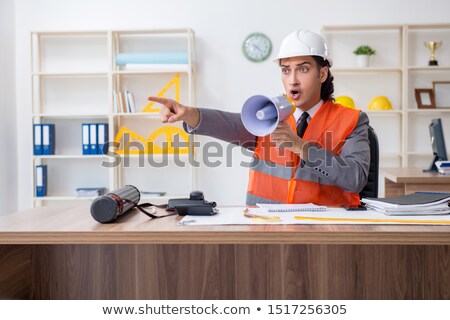 Stock photo: Young Architect Yelling With Megaphone