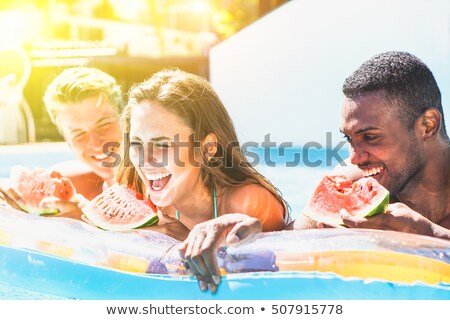 [[stock_photo]]: Happy Friends Eating Watermelon