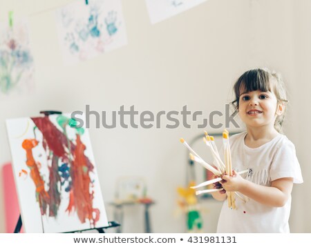 Zdjęcia stock: Cute Little Girl Focused On Drawing