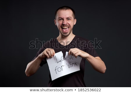 ストックフォト: Portrait Of A Young Businessman With Inscription Job