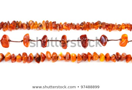 Stock photo: Beads Of Amber Laid In A Row