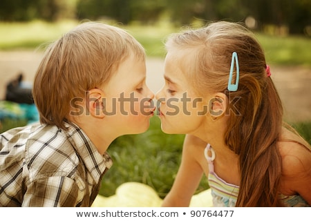 [[stock_photo]]: Adorable Little Girl Kissing A Boy