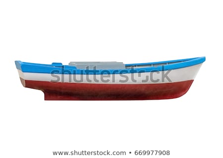 Stok fotoğraf: Small Rowing Boat On The Shore Of A Small River