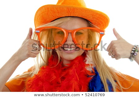 Stockfoto: Girl Is Posing In Orange Outfit For Soccer Game