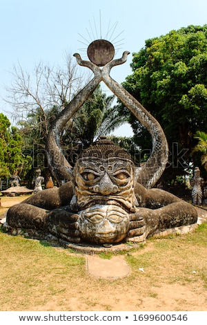 Foto d'archivio: Mythology And Religious Statues At Wat Xieng Khuan Buddha Park