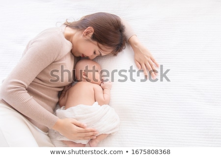 Сток-фото: Tender Love Of A Newborn Infant