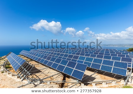 Stockfoto: Field Of Solar Panels Or Collectors At Sea