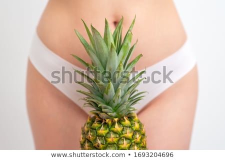 Foto stock: Girl In Underwear With Pineapple