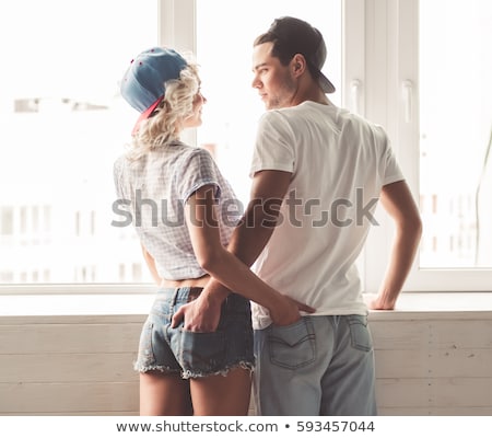 Foto stock: Back View Of A Smiling Attractive Couple In Love