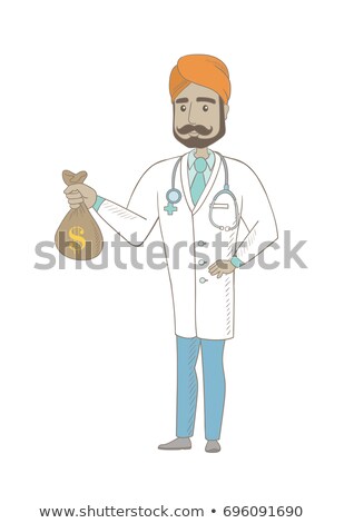 Stock photo: Young Indian Doctor Holding A Money Bag