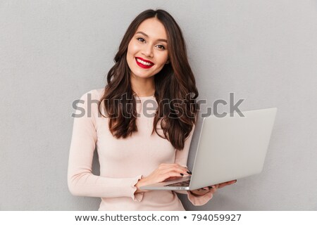 Stockfoto: Portrait Of Smart Female 30s With Beautiful Smile Holding Silver