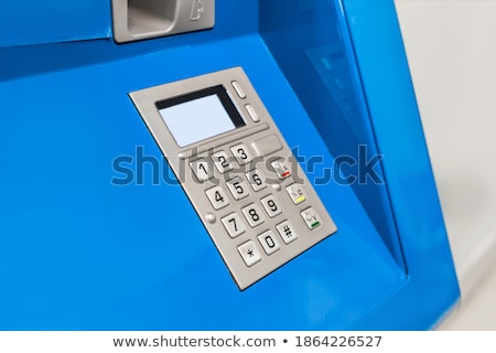 Foto stock: Customer Dialing Pin Code On Payment Terminal