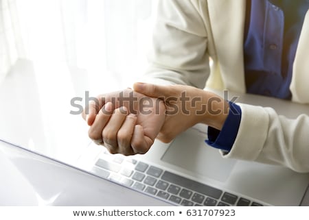 Foto stock: Businesswoman Holding Her Painful Wrist