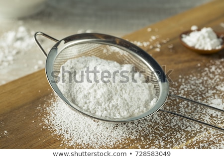 Foto d'archivio: Powdered Sugar In A Sieve