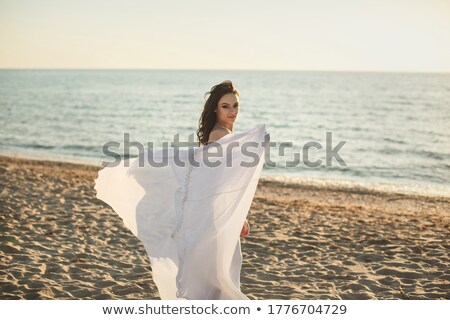 Сток-фото: Beautiful Young Woman Walking Outdoors At The Beach