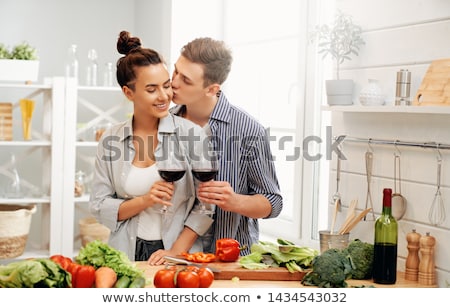 Stock photo: Loving Couple Is Preparing The Proper Meal