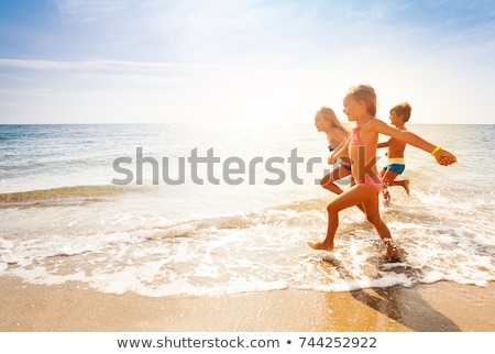 Сток-фото: Playing On The Beach