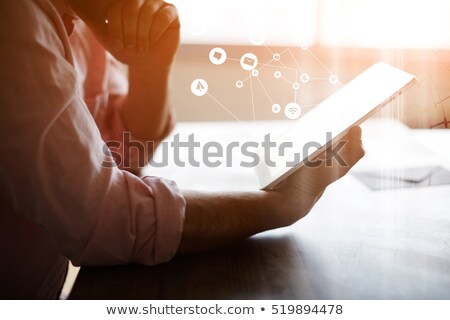 Stock fotó: Crop Businessman Using Tablet At Table